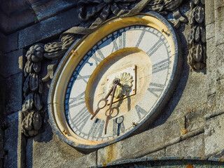 Porto, Portugal: Ancient Clock on historic building