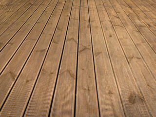 Wooden terrace with brown boards on the terrace floor