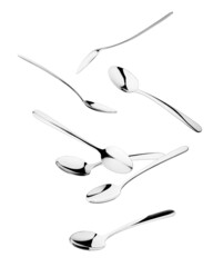 Falling spoon, cutlery on white background, isolated, clipping path