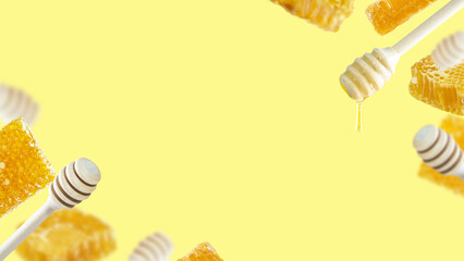 A set of honey dippers with drop of honey and pieces of honeycomb floating on a yellow background....