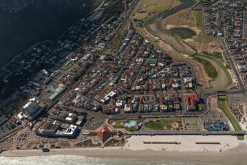 Muizenberg, Western Cape, South Africa. 2022. Aerial view of Muizenberg town centre and beach close to Cape Town.