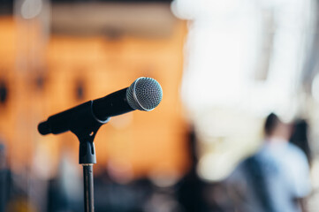 Microphone standing on a stage on a concert