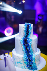 Multi level wedding cake on the table