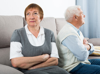 Husband and wife having disagreement with each other at home