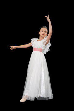 Girl ballet dancer in white long dress expression dancing on black background. Full length, studio shot. Part of photo series