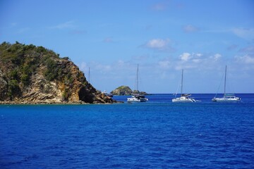 Boats moored at The Caves on Norman Island British Virgin Islands