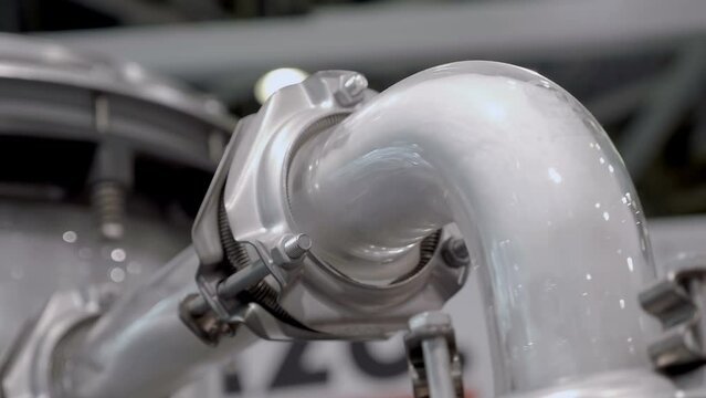 Plastic white granules for the production of a polymer film on a special industrial equipment by blowing, to obtain a tubular membrane using extrusion heads. Closeup