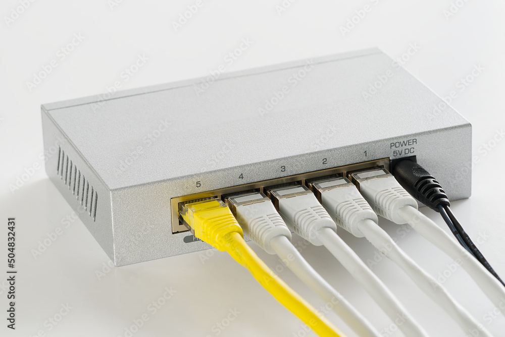 Aufkleber Small router and switch. tcp ip network business concept. High - performance gigabit switch. home network gray switch.