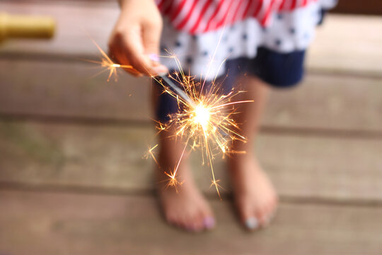 Sparkler Held By Child