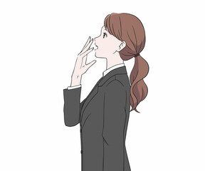 スーツを着て驚く女性