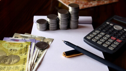 Economic growth,success pillars,Closeup photo of coin,salary growth,saving and investing ,financial...