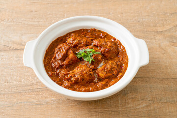chicken tikka masala spicy curry meat food with roti or naan bread