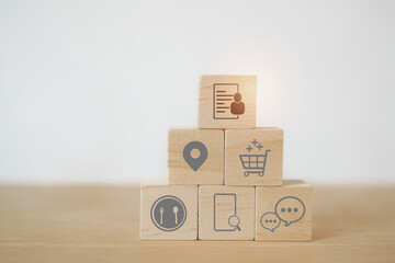 customer target concept, stack of wooden cube blocks with client persona icon for personal behavior for marketing strategy, market research or analysis - obrazy, fototapety, plakaty