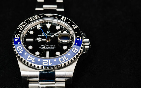Bangkok Thailand- Feb 20,2022 : Rolex GMT-Master II "Batman"40mm with blue-black bezel Steel Ceramic Men's Wrist watch on black background