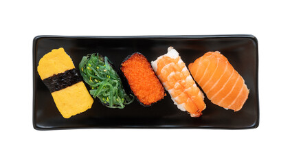 Assorted sushi nigiri and maki set on black plate