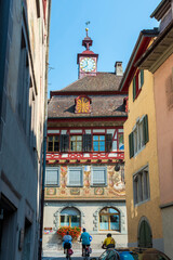 Vintage old town street lanscape with timbered houses town hall at the end in the historical town in Eastern Europe  on a sunny summer day