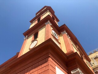 Colorful bell tower of the church of Pozzuoli seen from below