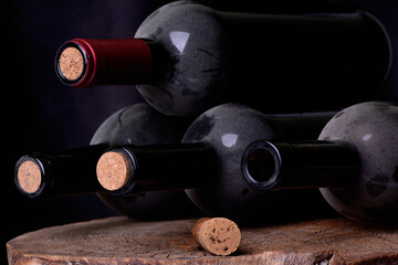 Bottle of wine on wooden background