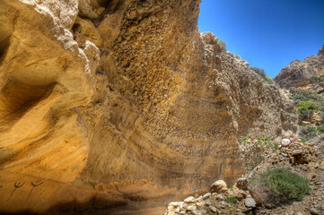 Uplifted layered wavecut notch on Crete, Greece, shows that the land has been lifted up or the sea...