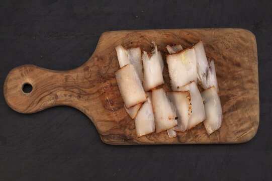 Dry salt salo, traditional Slavic food, slab of fatback frozen and thinly shaved