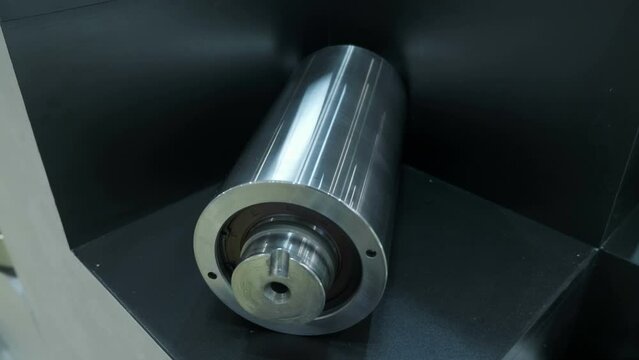 New industrial bearings of various types and sizes are presented at the machine tool exhibition. Close up. Shot in motion