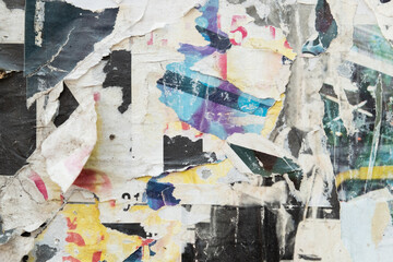Grungy ripped and torn street paper poster background