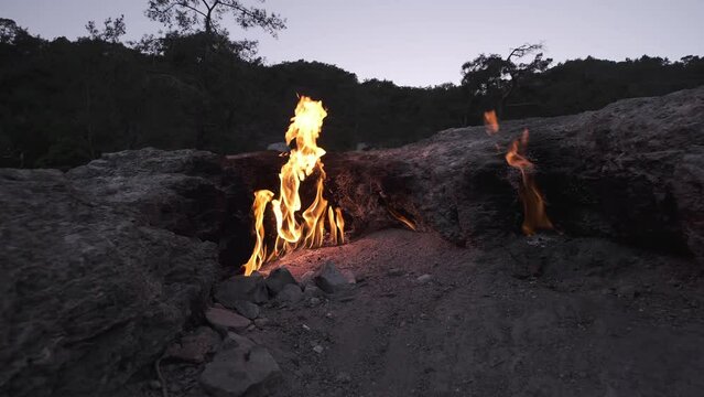 buring eternal flame in rocks of famous Mount Chimaera in Antalya, Turkey
