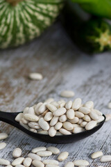 raw white beans with vegetables for cooking background