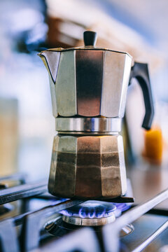 Stovetop espresso coffee maker on kitchen gas stove