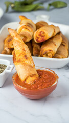 Mini pizza rolls with tomato and cheese