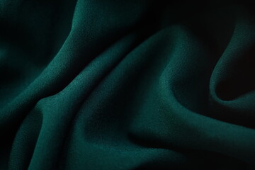 Emerald material chiffon waves, delicate dark green thin fabric - obrazy, fototapety, plakaty