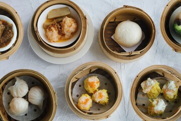 Chinese dim sum on table.