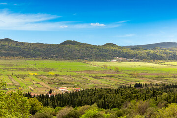 Fototapeta na wymiar Springtime Landscape. Mountain valley on a spring day