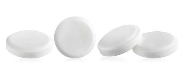Set of white round pills isolated on white background