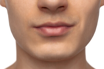 Obraz premium Cropped face of young man with well-kept skin isolated on white studio background. Concept of men's health, vision, self-care, medicine and cosmetics.