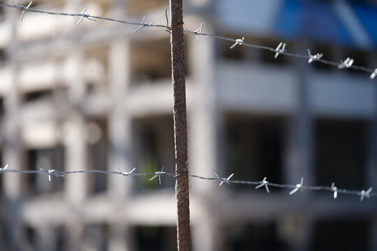 Security barbedwire fence, wire with clusters of short, sharp spikes