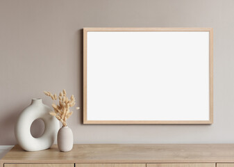 Empty horizontal frame mockup in modern minimalist interior with plant in trendy vase on white wall background. Template for artwork, painting, photo or poster - 504894033