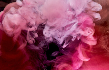 Pink smoke on black ink background, colorful fog, abstract swirling touch ocean sea, acrylic paint pigment underwater