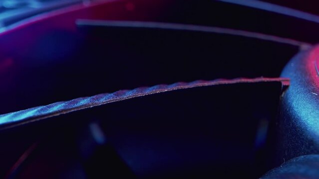 Computer fan with curved blades close-up. State-of-the-art enclosure cooling system. High quality 4k footage
