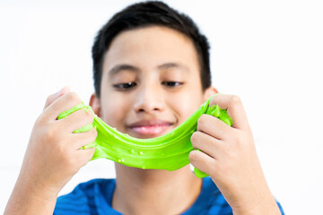 Homemade Toy Called Slime, Kids having fun and being creative by science experiment