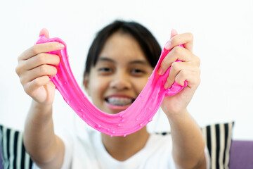 Homemade Toy Called Slime, Kids having fun and being creative by science experiment