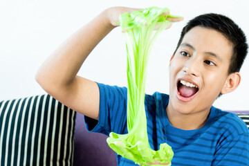 Homemade Toy Called Slime, Kids having fun and being creative by science experiment