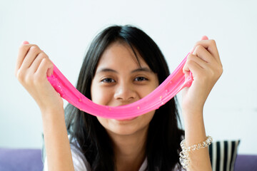 Homemade Toy Called Slime, Kids having fun and being creative by science experiment