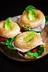 Bagel sandwiches on a dark background. Healthly food. Keto snack.