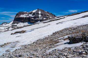 View of Piz Boe Mountain of the Sella Group with snow in Italian Dolomites at the Province of...