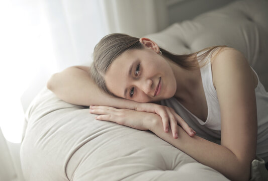 portrait of a teenger girl on a  sofa