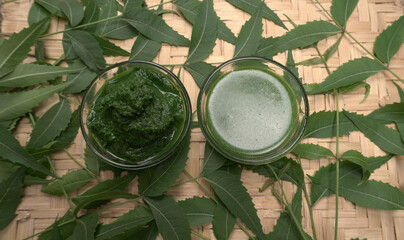 Neem leaves or Azadirachta Indica used as ayurvedic medicine with ground neem paste and juice Used...