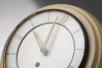 Macro view of hands of wall clock.