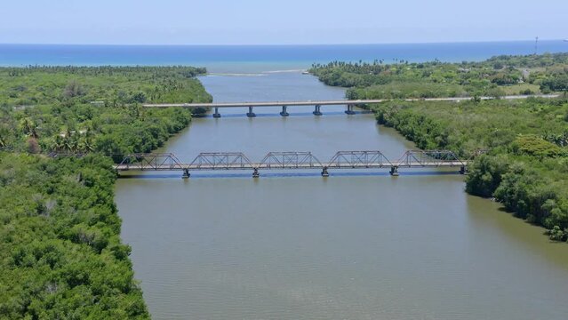 Aerial View Of The Former Bridge With The New Bridge Over Rio Soco At San Pedro de Macoris In The Dominican Republic.