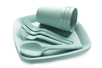 Bright plastic disposable tableware isolated on white background. Top view